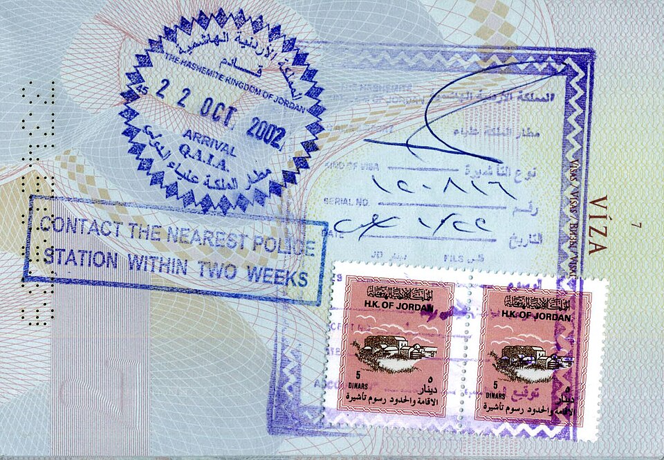 A Jordanian visa stamp in a passport